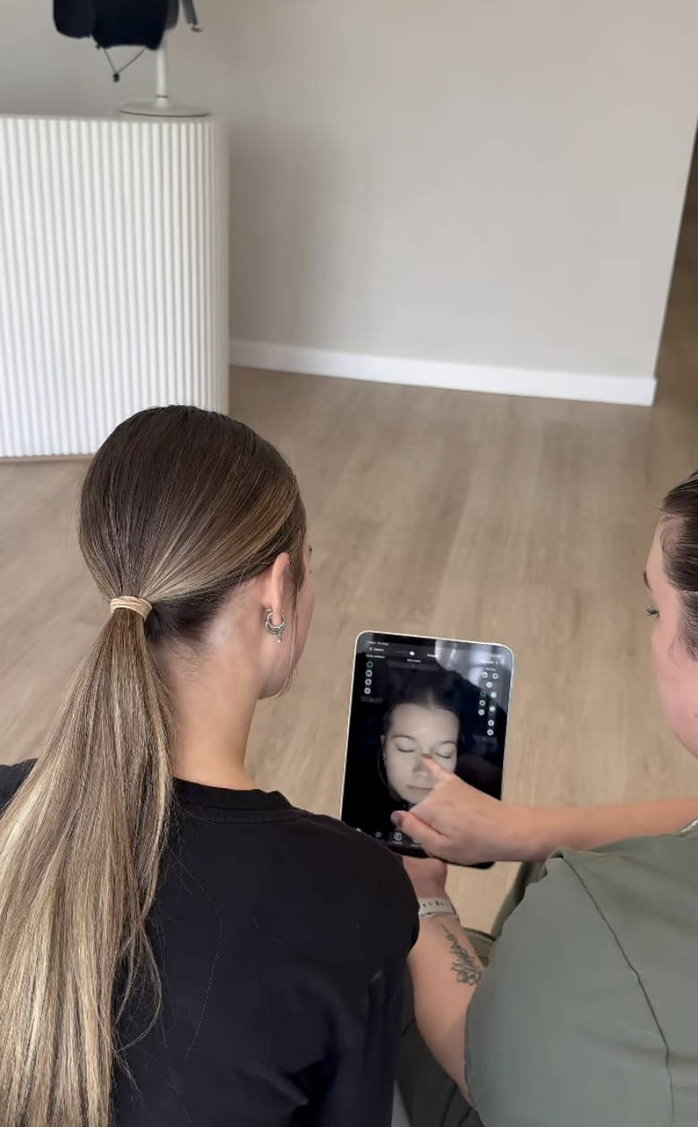 A relaxed Renew client during a skin treatment