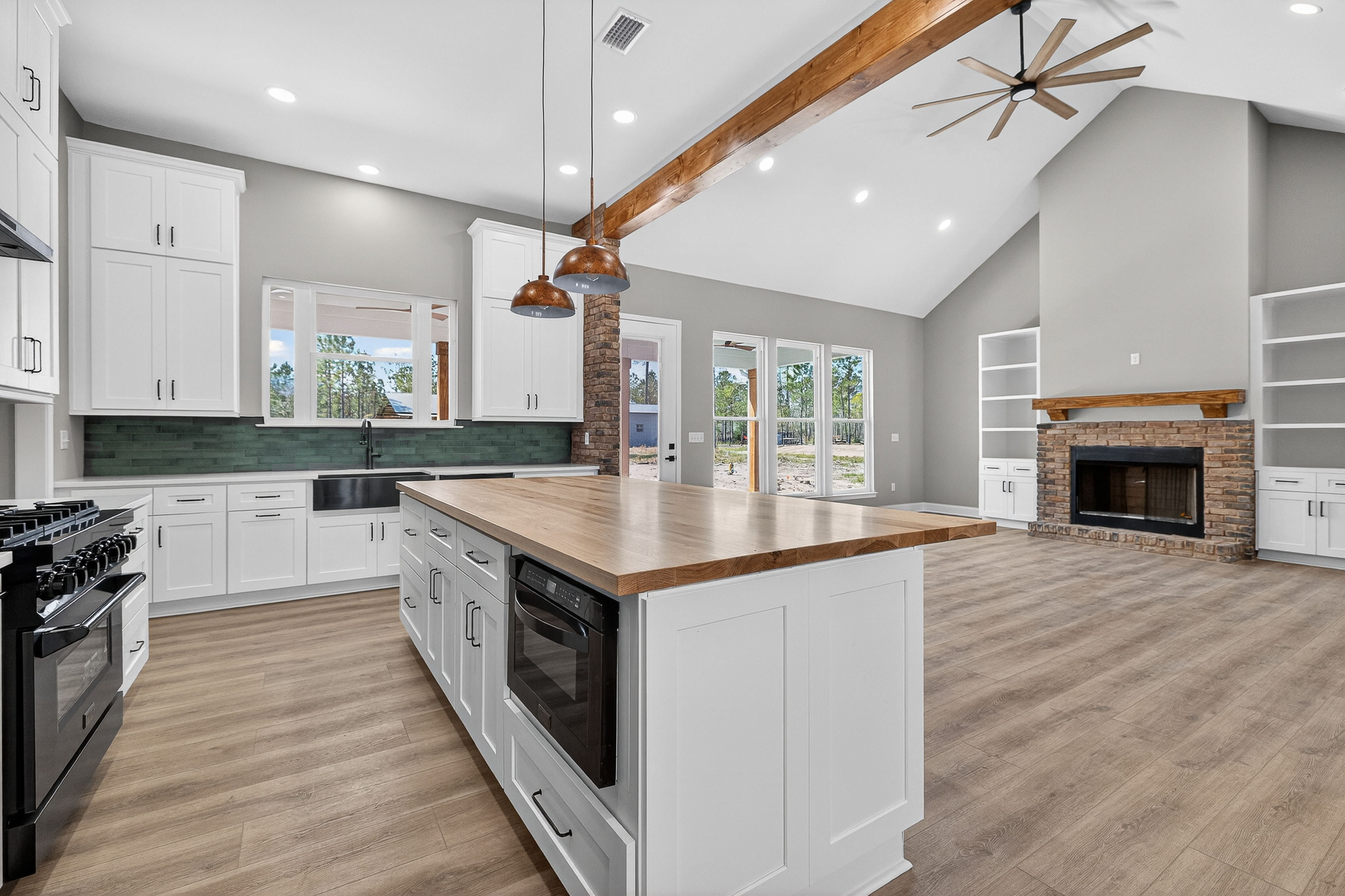Custom home planning process with blueprints and design materials