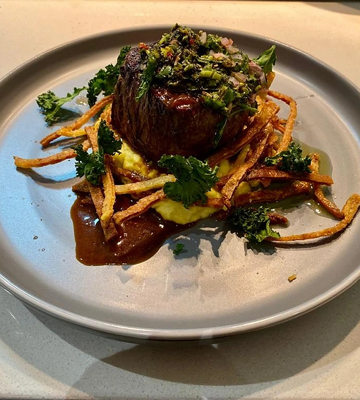 Beef tenderloin with edible flowers