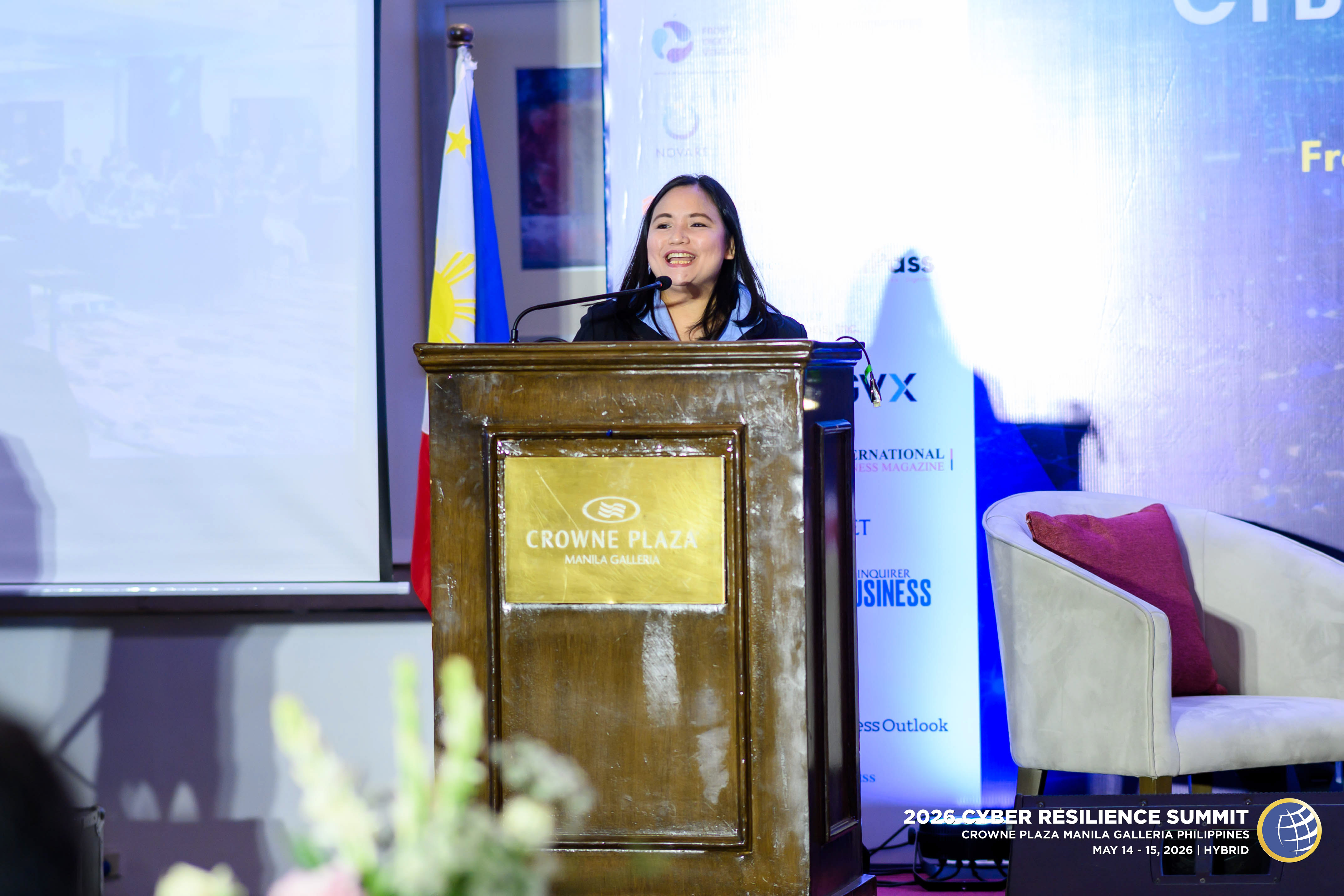 A speaker addressing the audience at a past summit