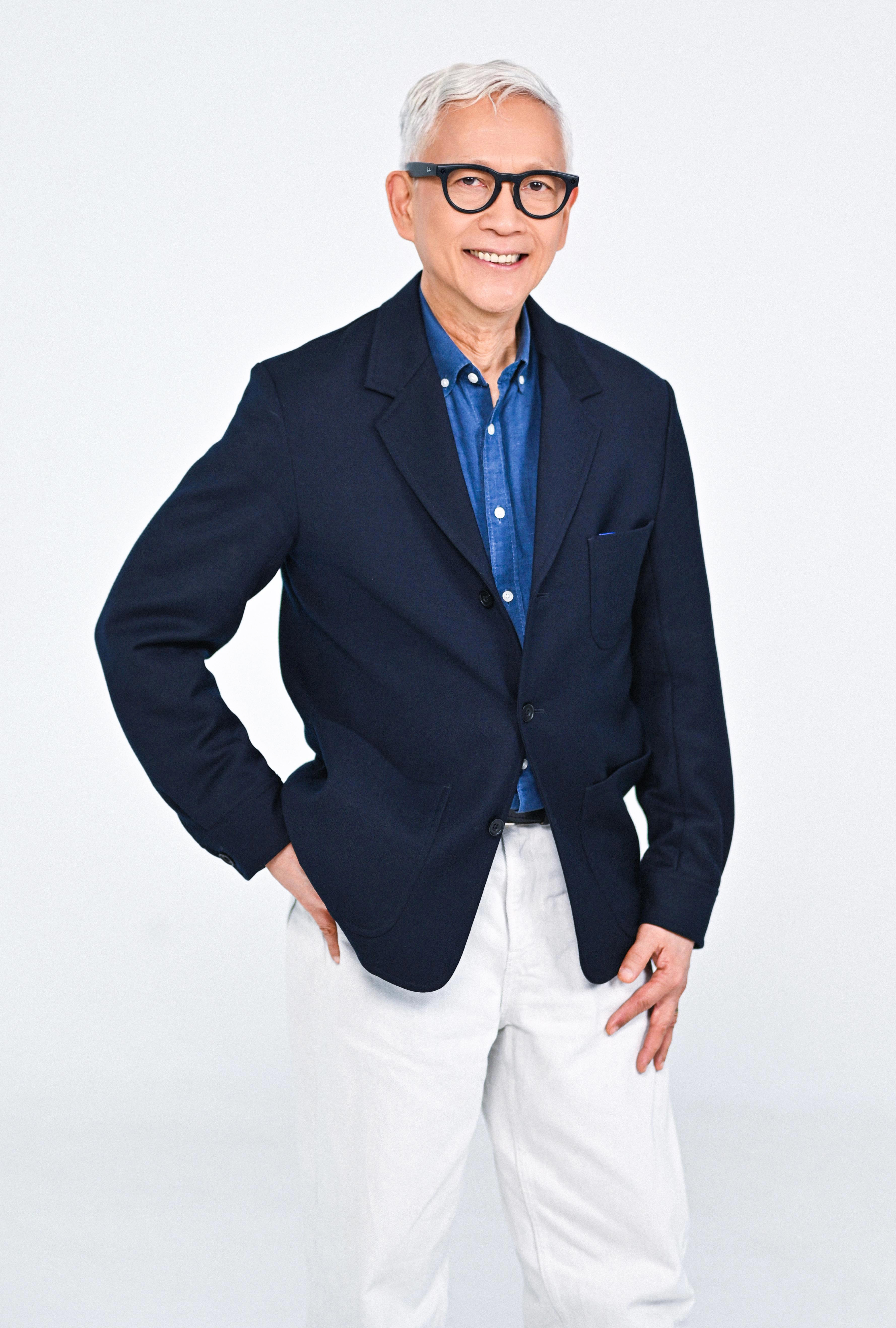 Francis Kong standing on stage