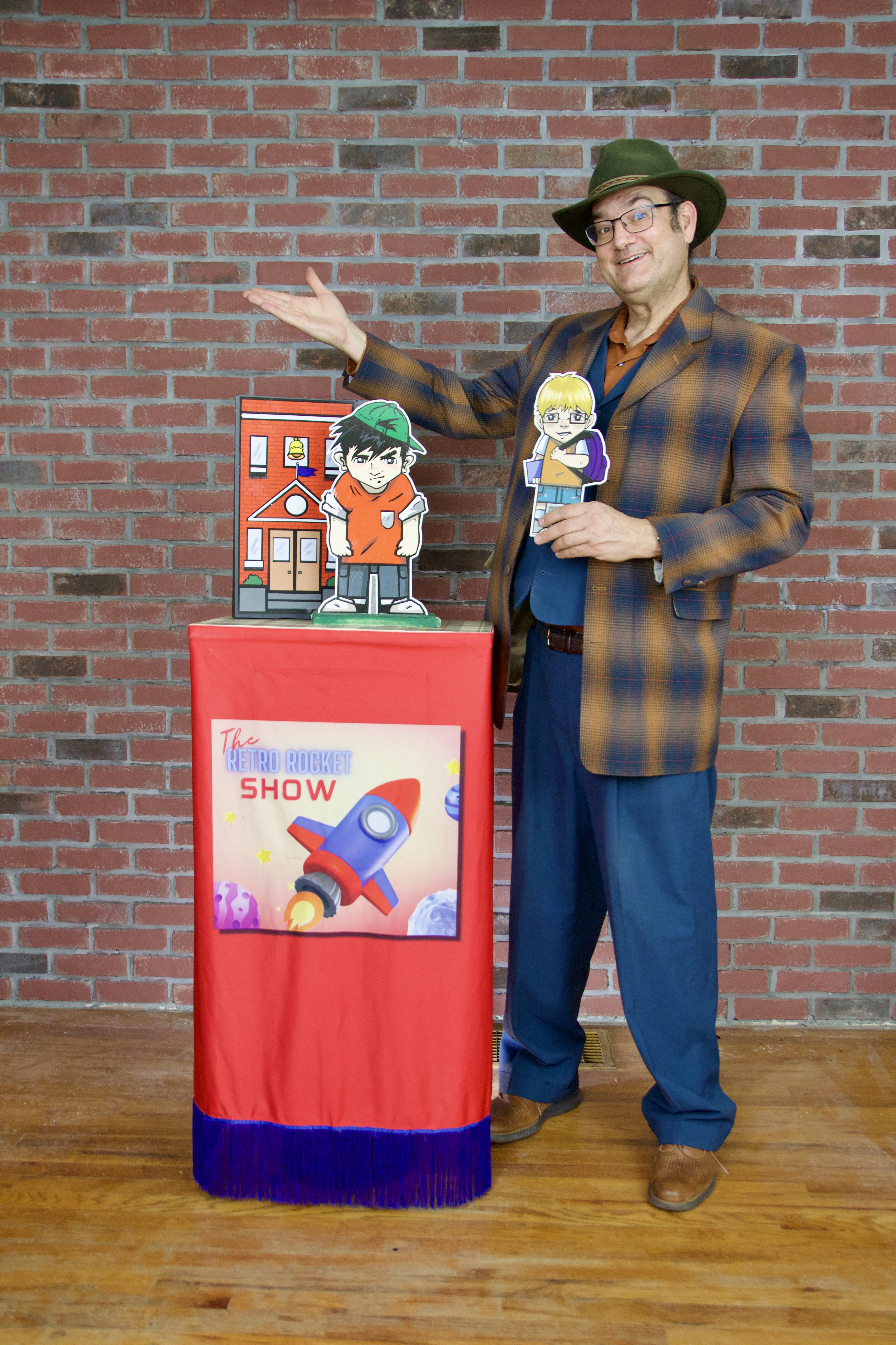 Keir Royale making children laugh during an interactive magic show