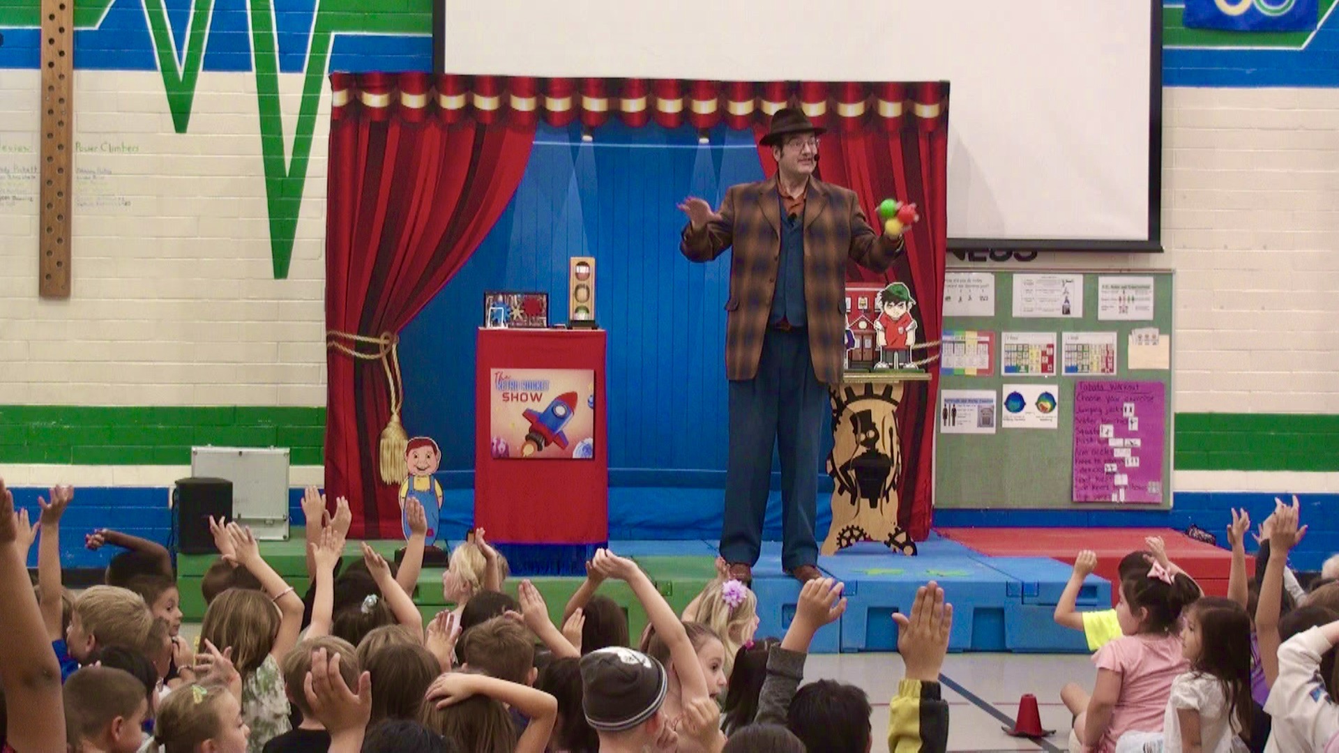 Keir performing a school magic show
