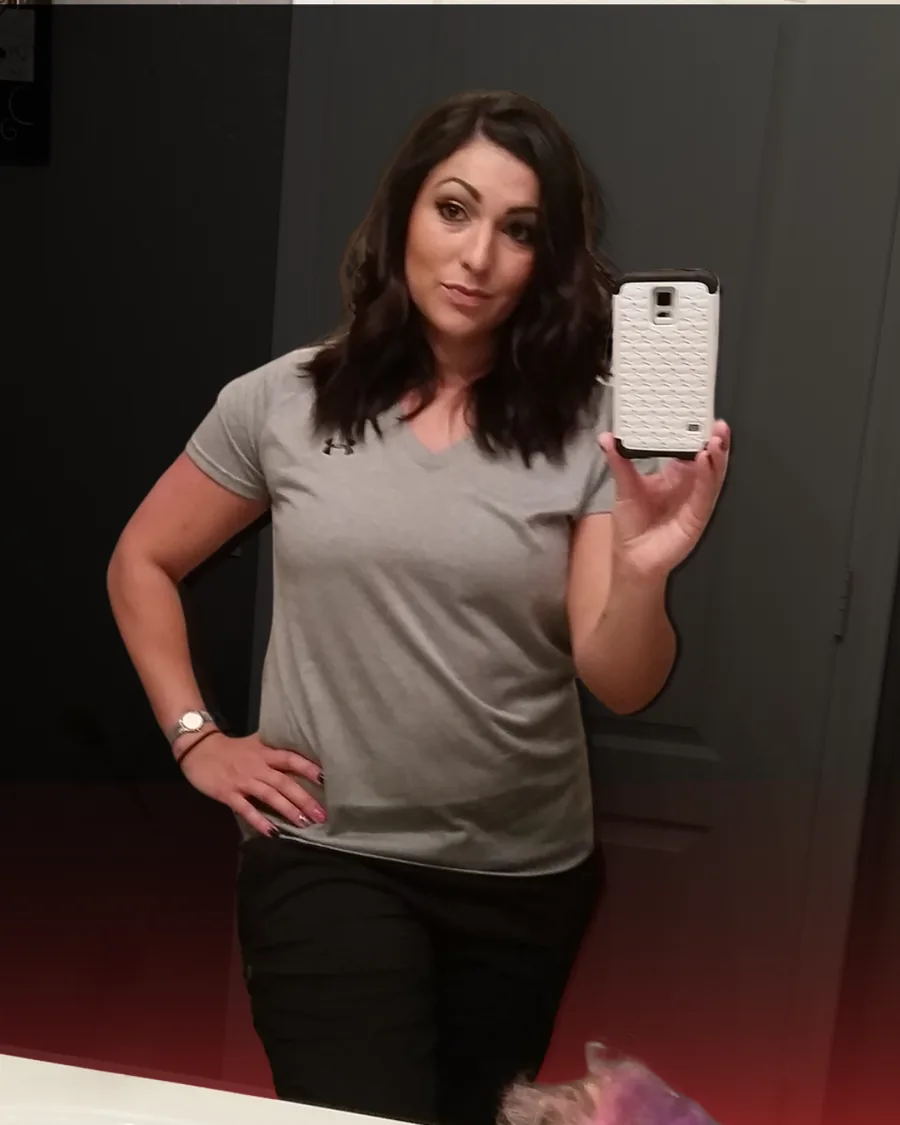 Dr. Christina early in her recovery, standing in a grey training top