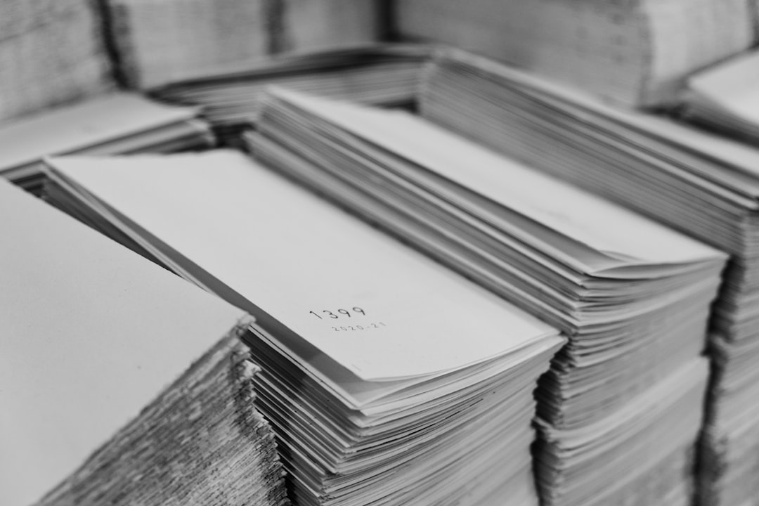 EDDM postcards stacked for mailing