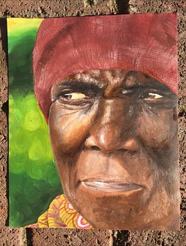 Portrait with a red headwrap or cap against green