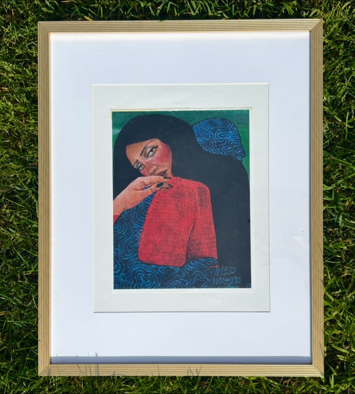 Framed dark-haired figure in red with blue patterned shapes