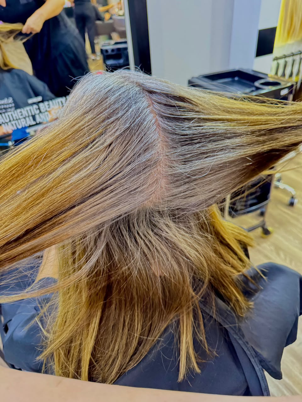 Before Grey Blending Dubai on medium brown hair with root regrowth