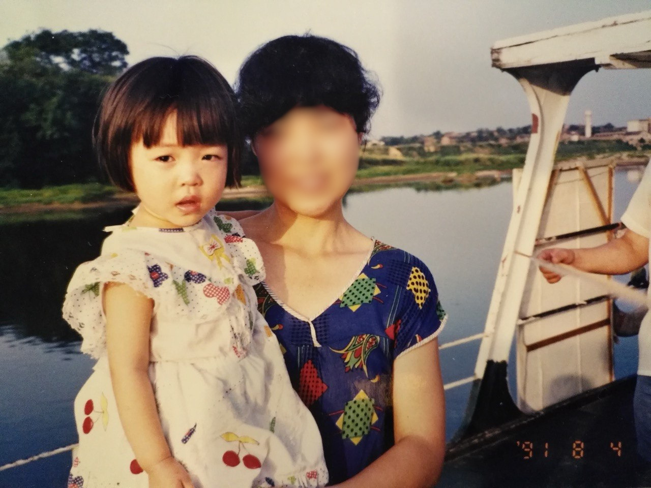 Claire as a child with her mother