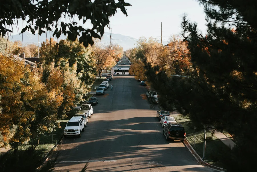 Tree-lined street in autumn south of the BYU campus in Provo, Utah