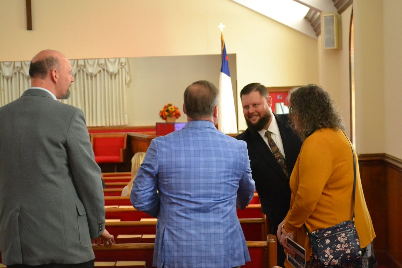 Fellowship near the pulpit after service