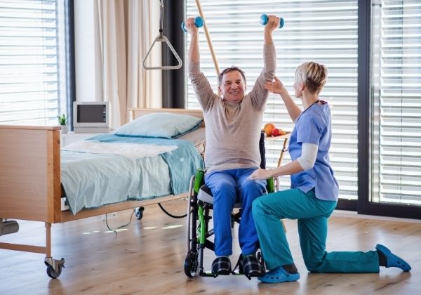 Physical therapist treating a patient at Radiant PT Tacoma
