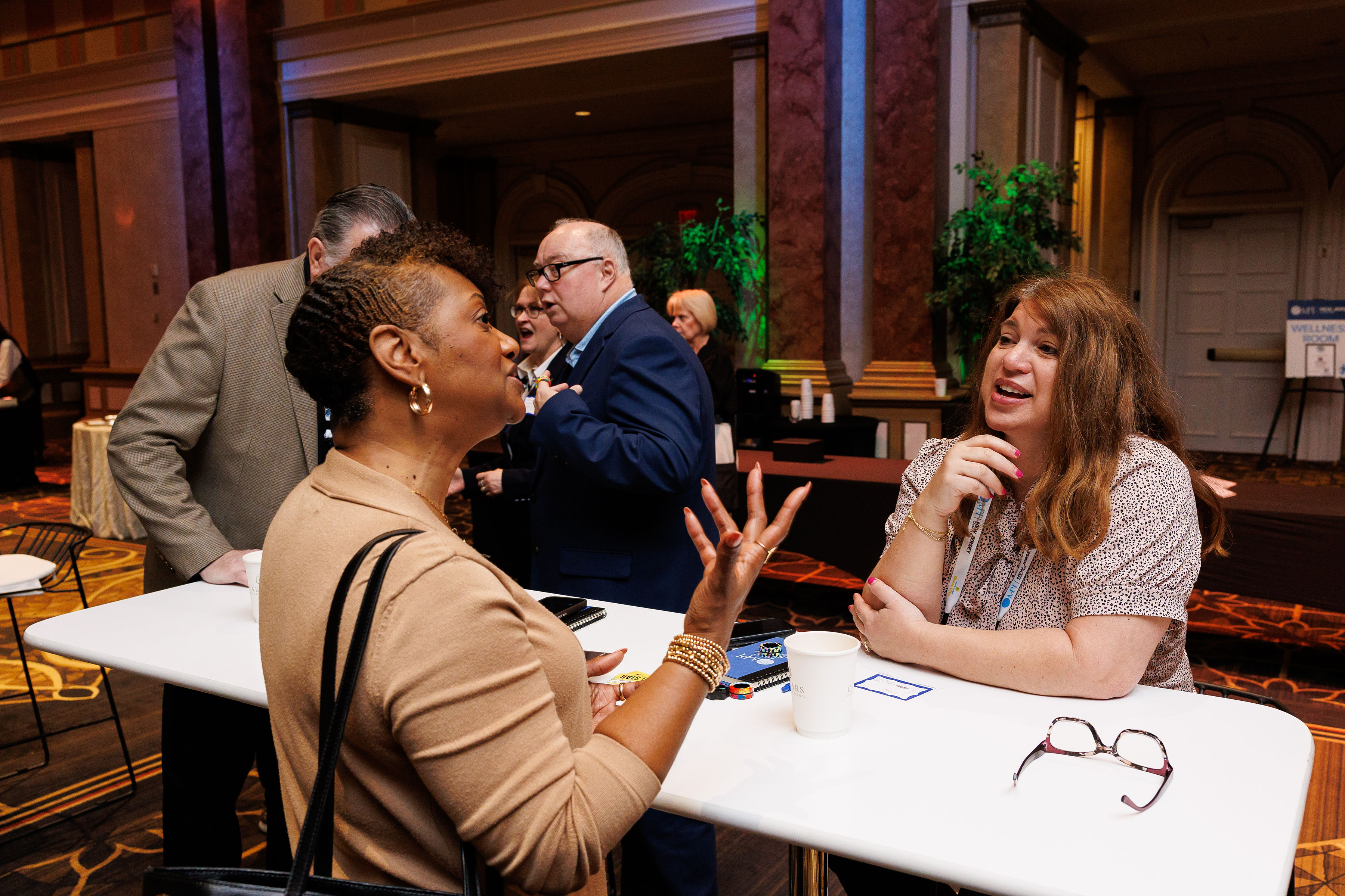 Attendees in conversation