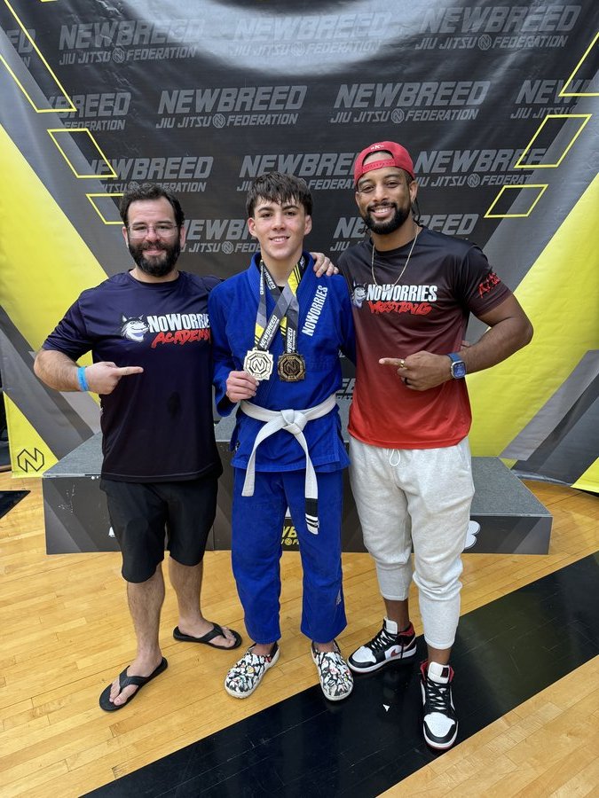 NoWorries Academy youth competitor with medals at Newbreed Jiu Jitsu Federation