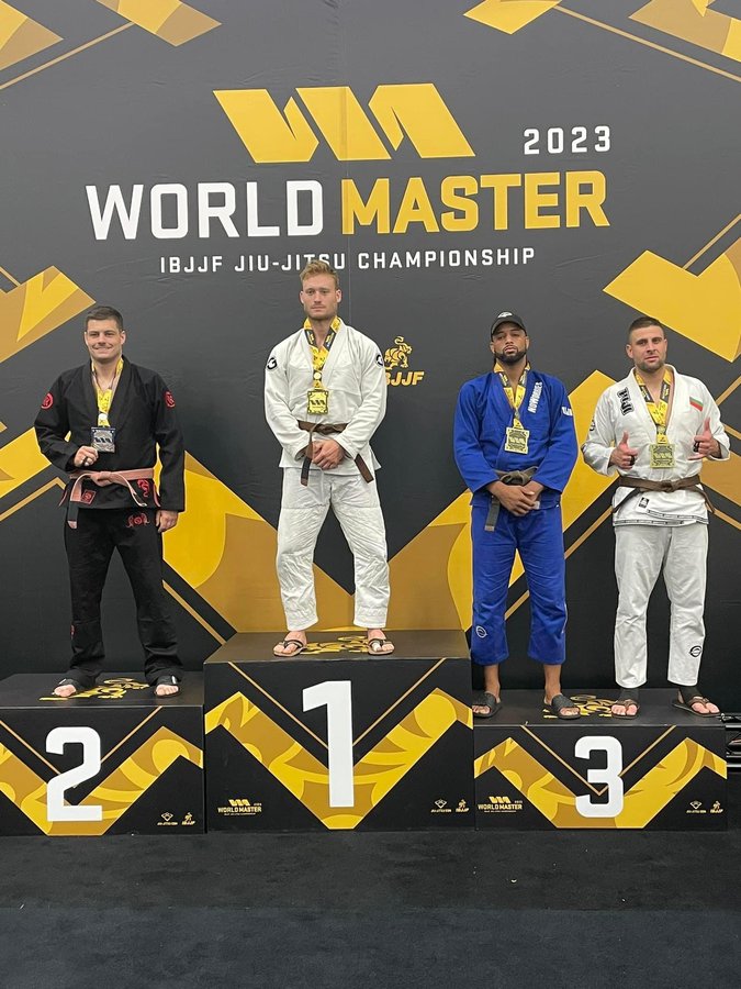 NoWorries Academy athlete on podium at IBJJF World Master Championship