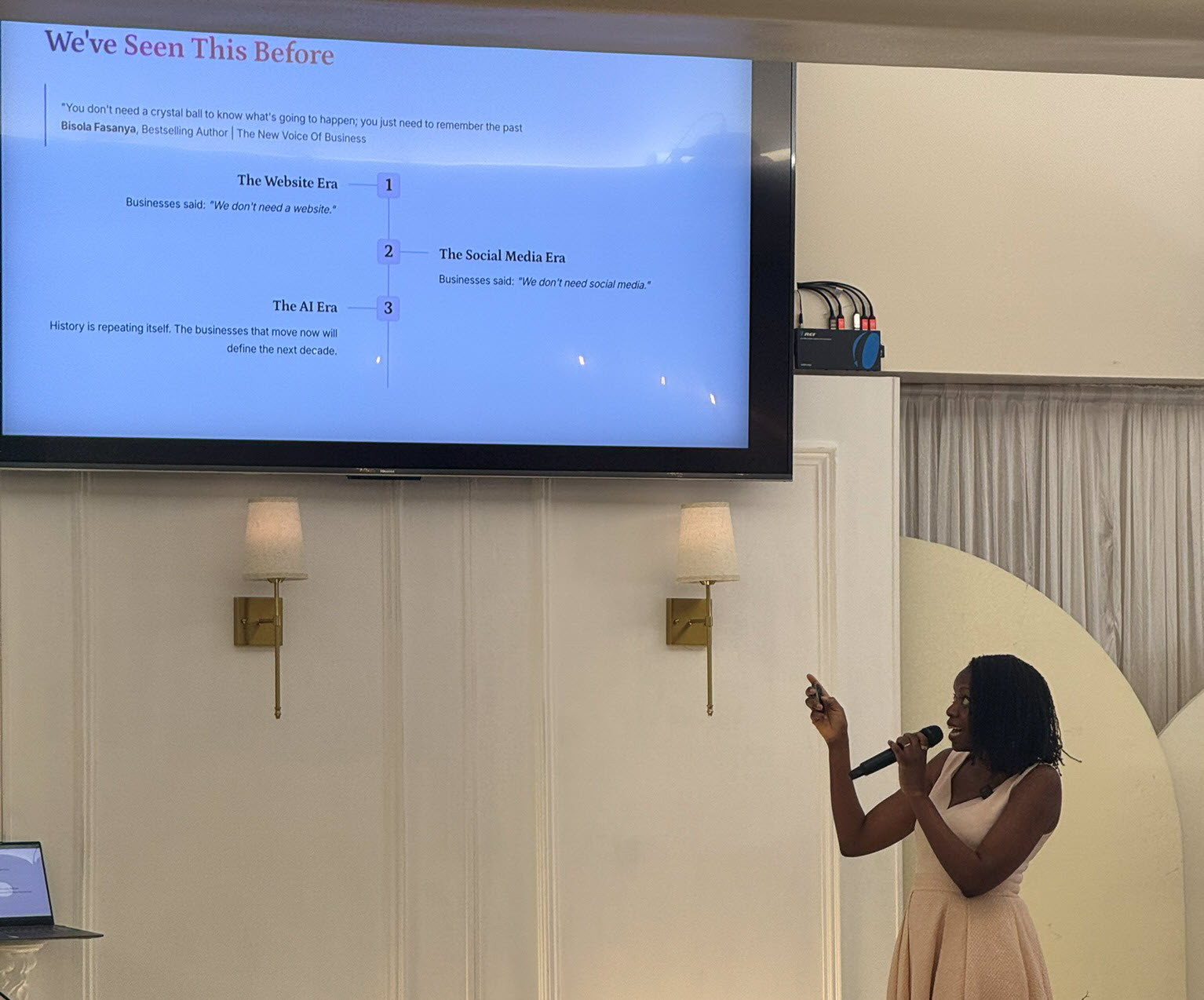 Bisola teaching a strategy session with her presentation