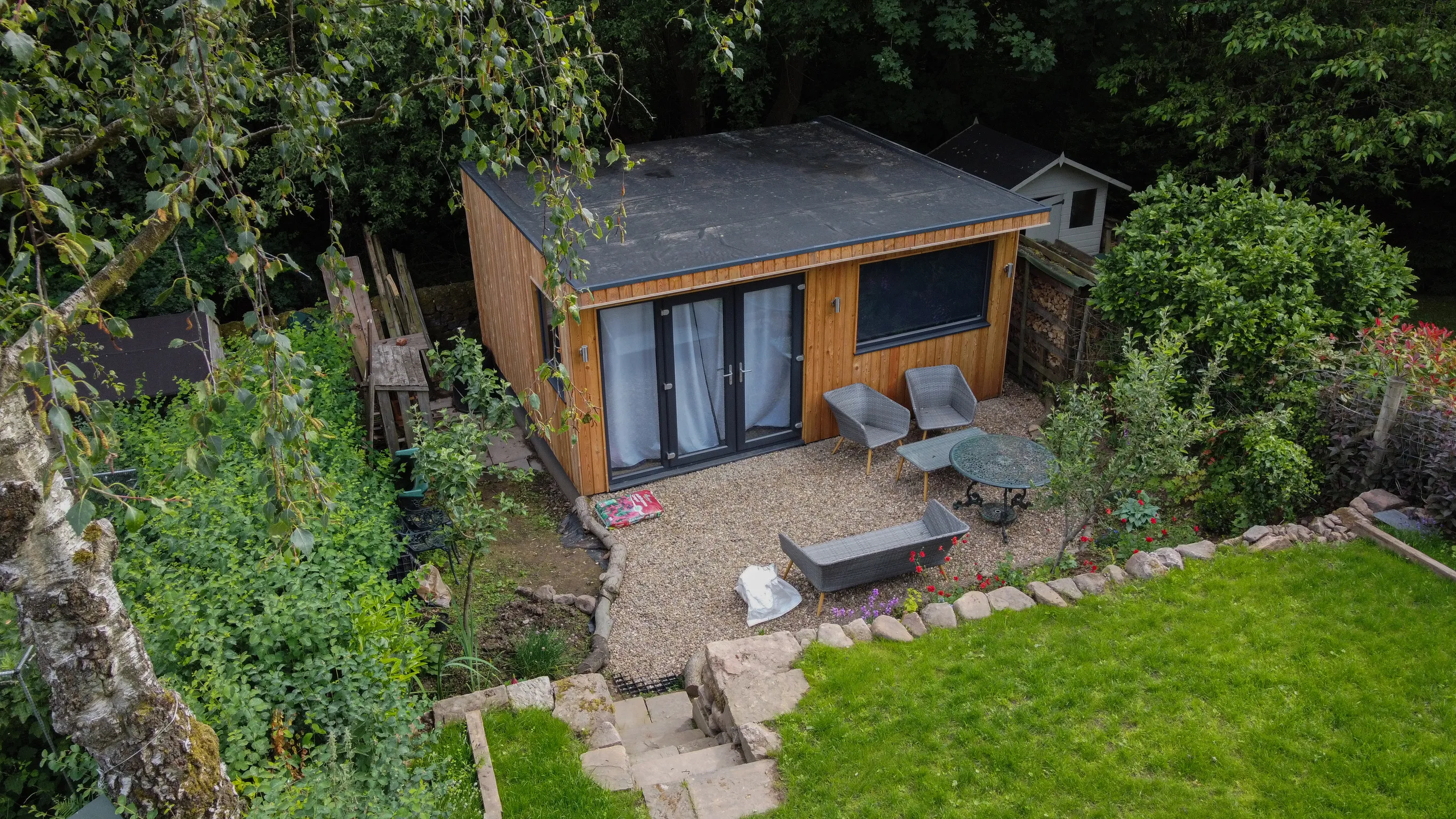 Modern insulated garden studio in a landscaped garden