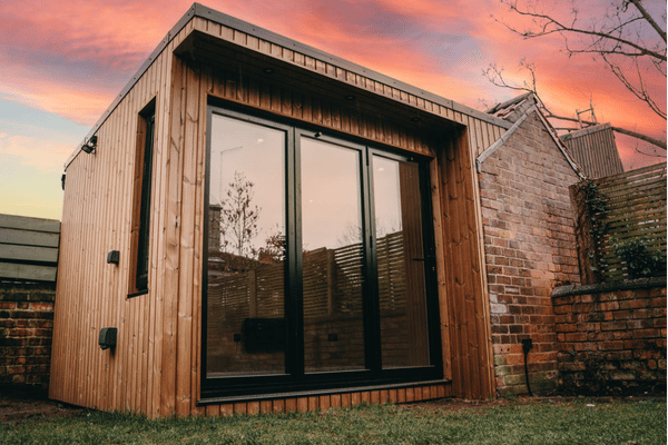 Photorealistic modern insulated garden office with timber cladding