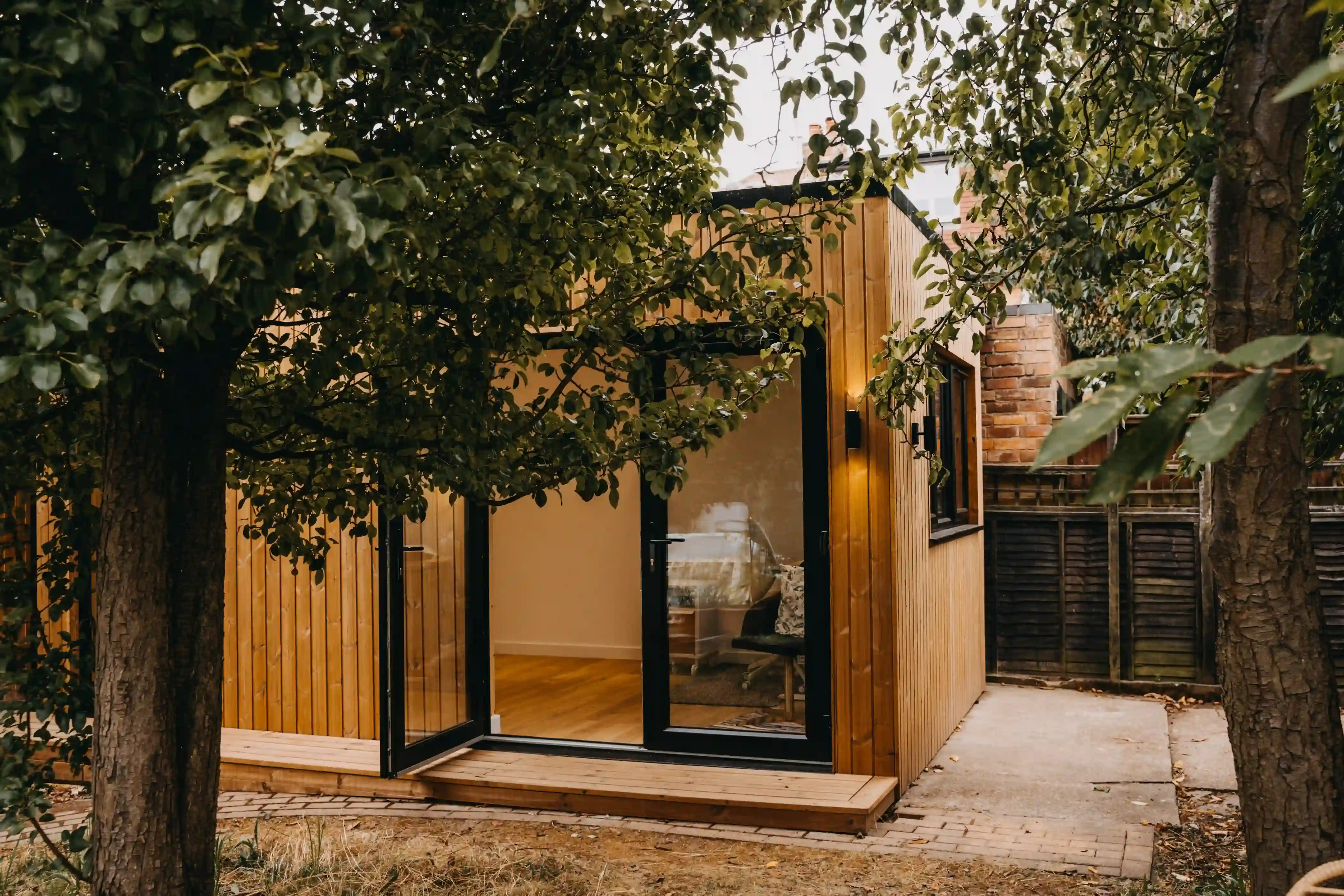 Converting an unused concrete panel garage into a highly insulated, multi-purpose garden room.