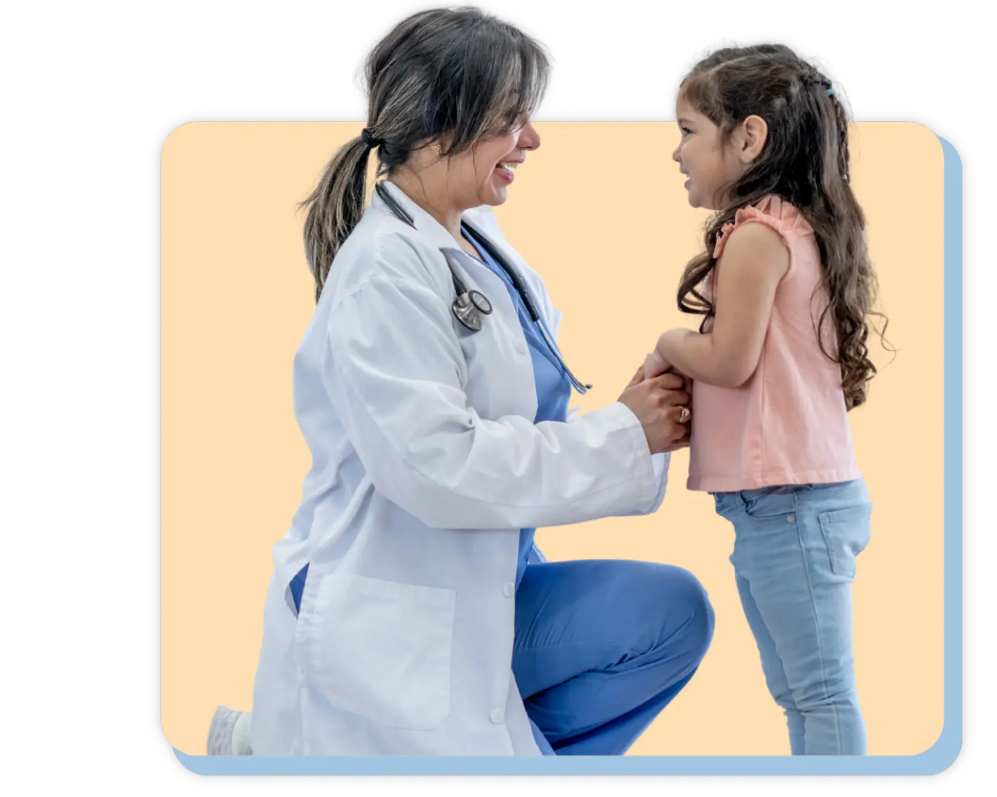 Direct primary care physician providing a health consultation for a child patient in a family-focused healthcare setting.