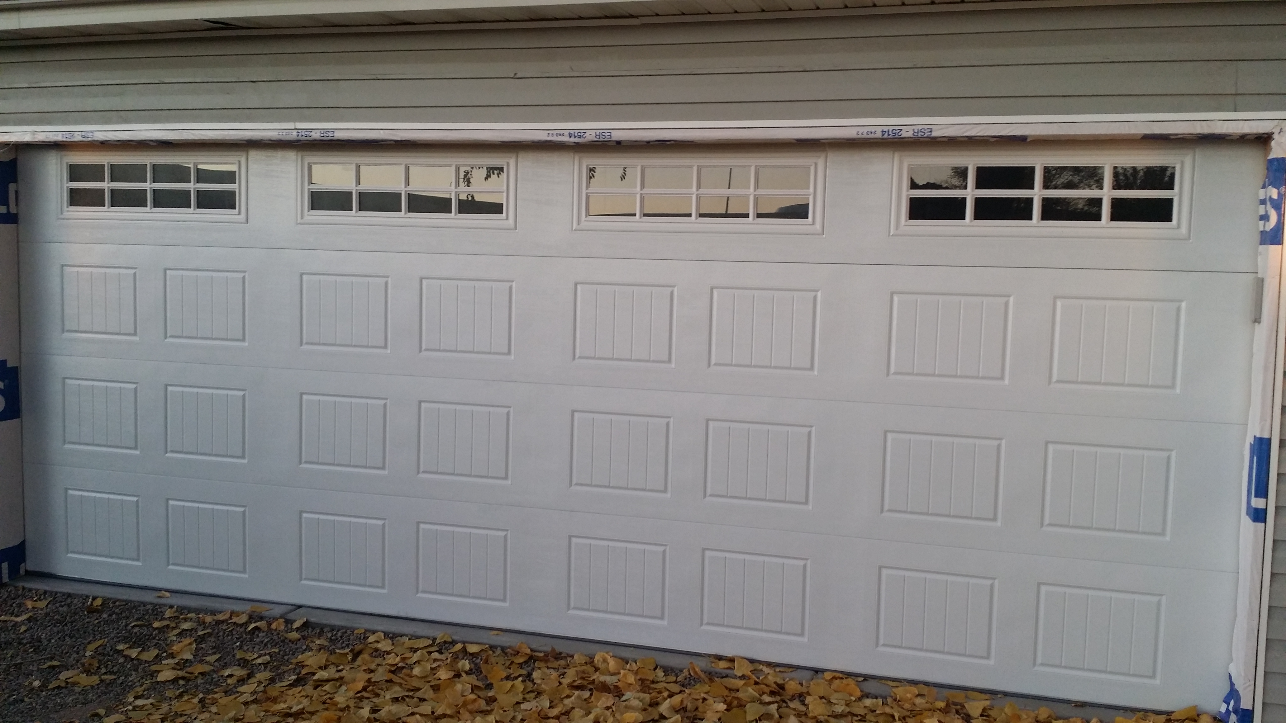New carriage house garage door installation in Lehi, Utah