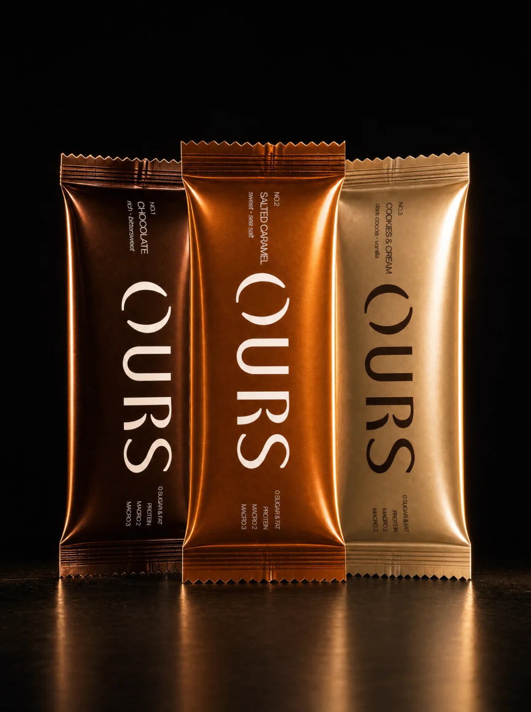 The three OURS bars, Chocolate, Salted Caramel and Cookies and Cream