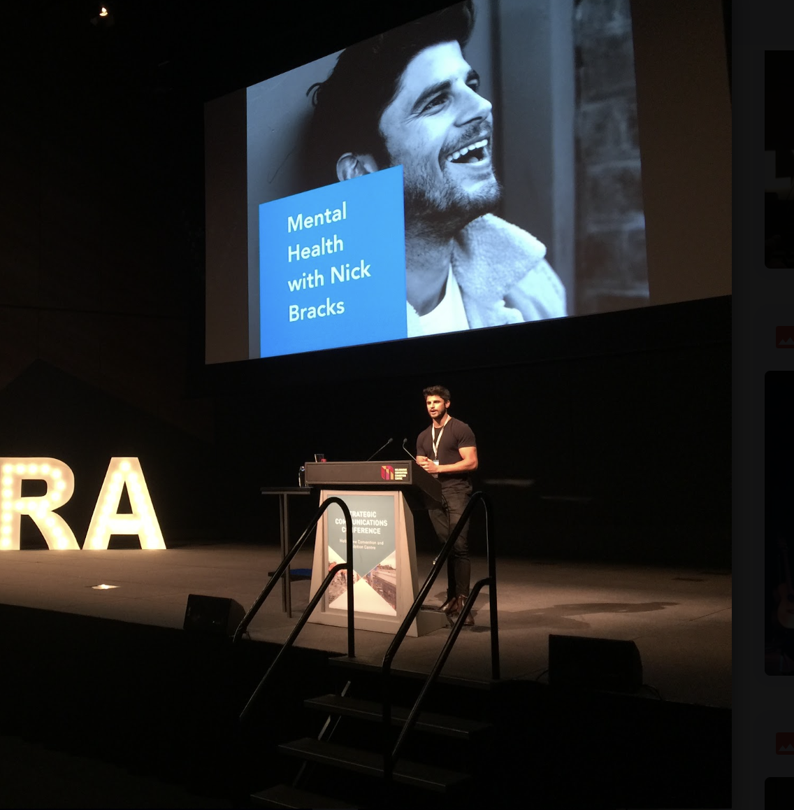 Nick Bracks delivering a keynote on stage
