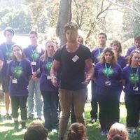 Nick Bracks speaking on stage