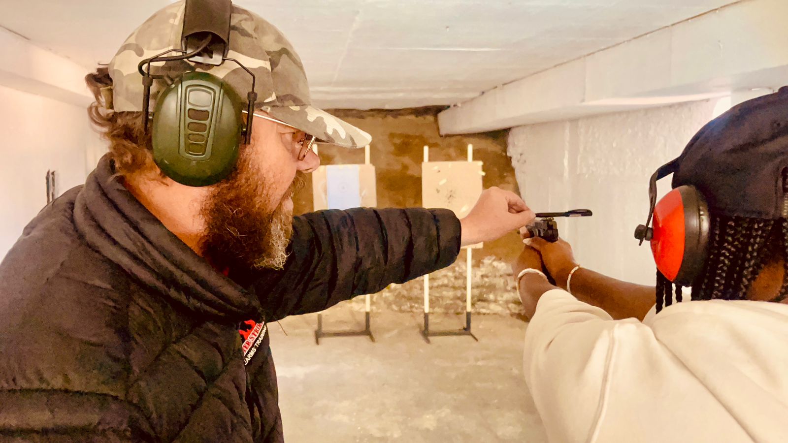 Professional instructor conducting firearm safety and competency training