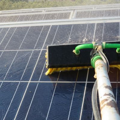 Solar panel cleaning brush in action