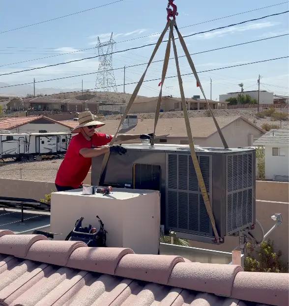 New rooftop AC unit being set by crane on a Lake Havasu City AZ home