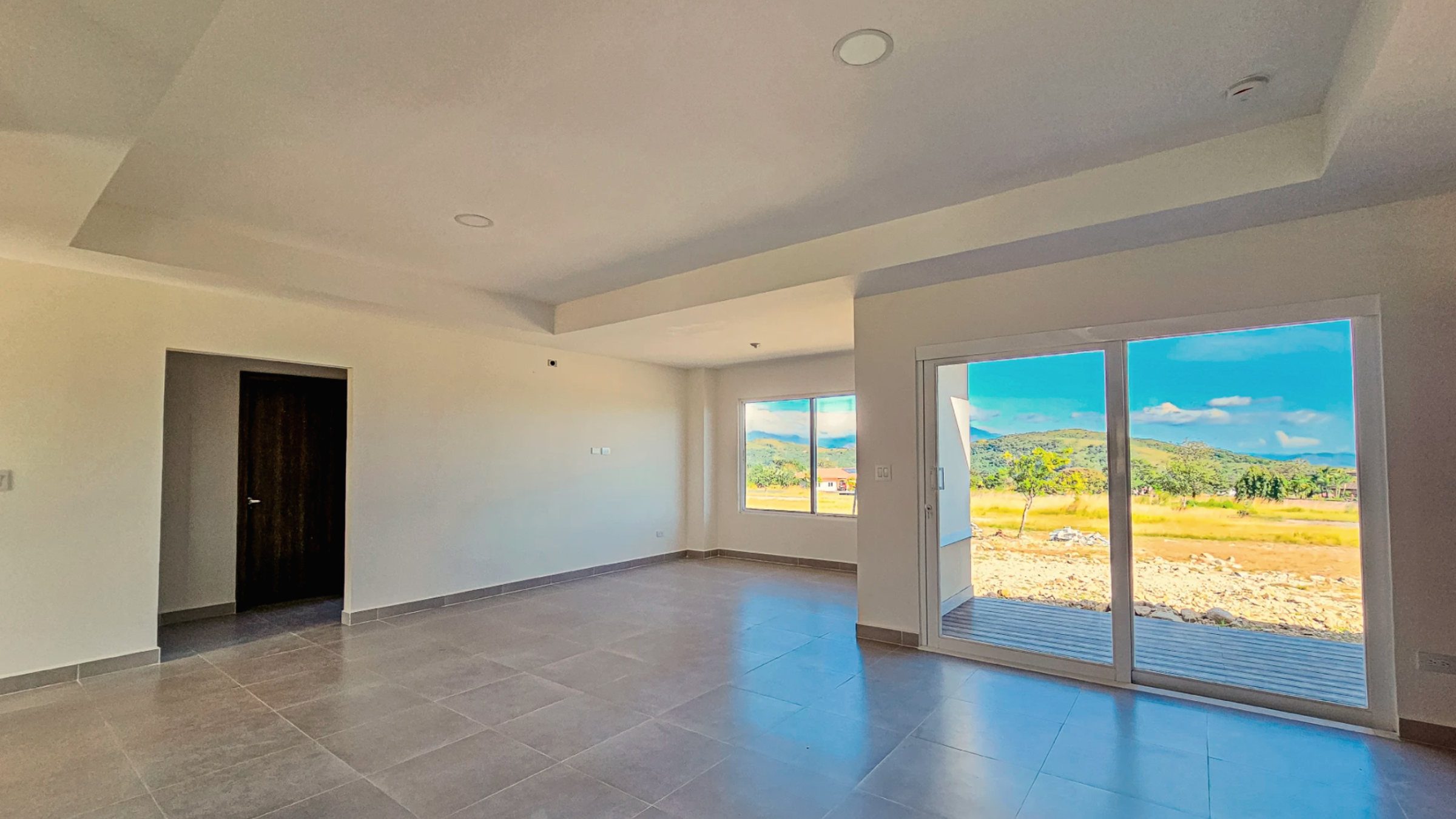 Sala con vista exterior en Boquete Canyon Village