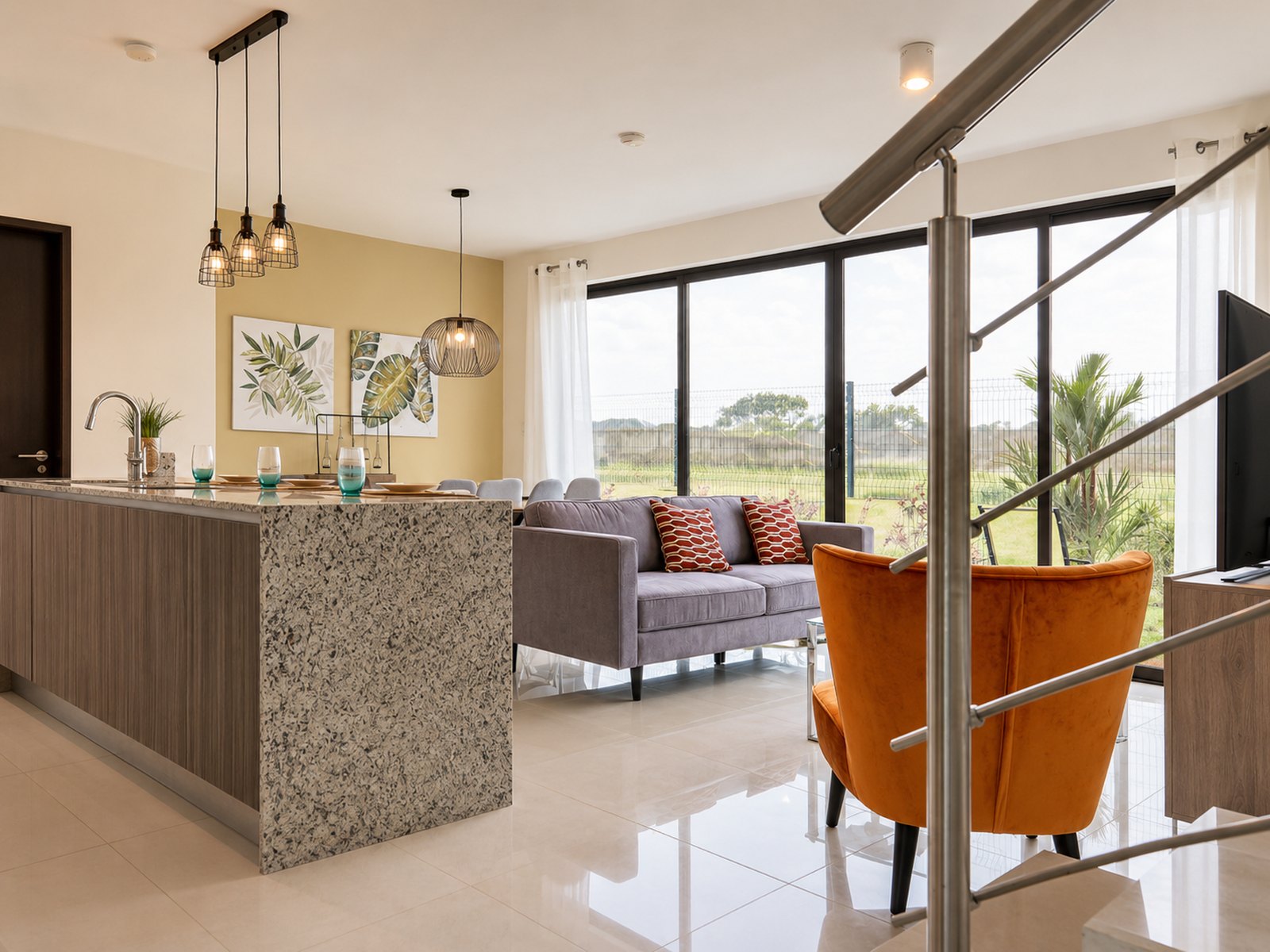 Cocina y sala del modelo Manhattan en Riverview Costa Verde