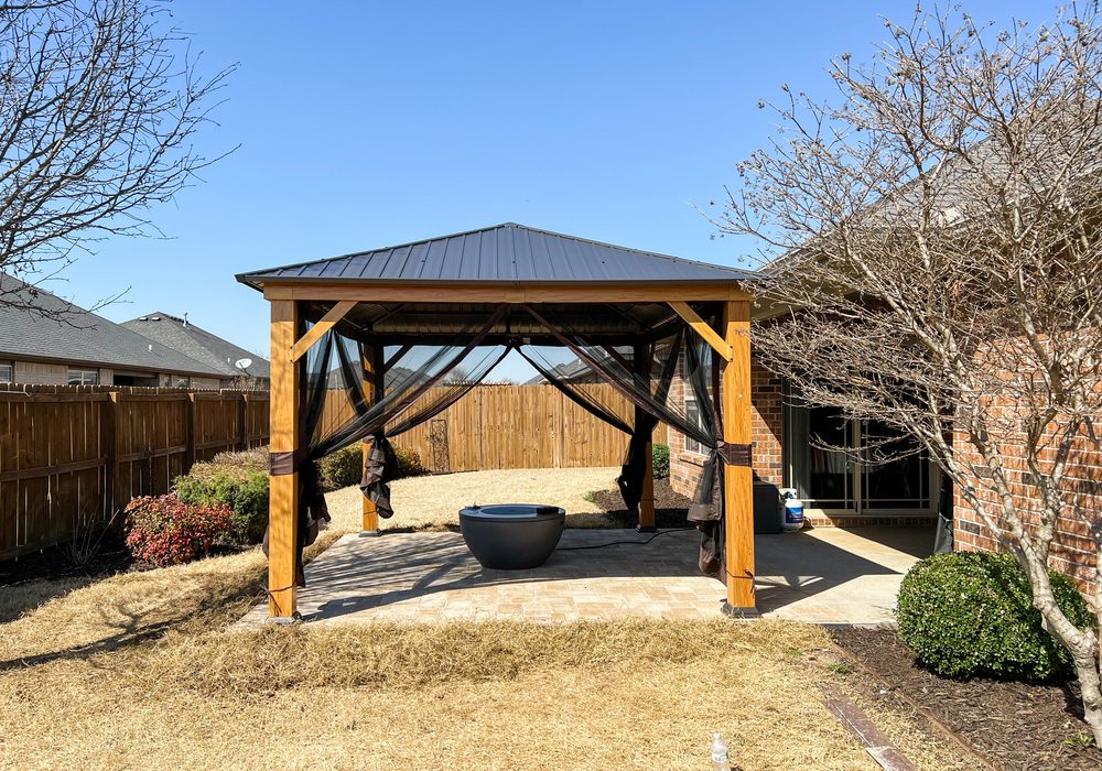 Cedar gazebo over a fire pit patio