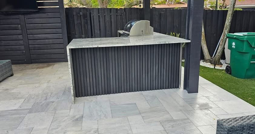 Outdoor kitchen with pergola for entertaining in Davie FL