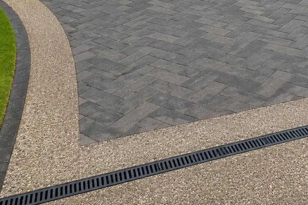 Smooth modern driveway with clean edging and drainage