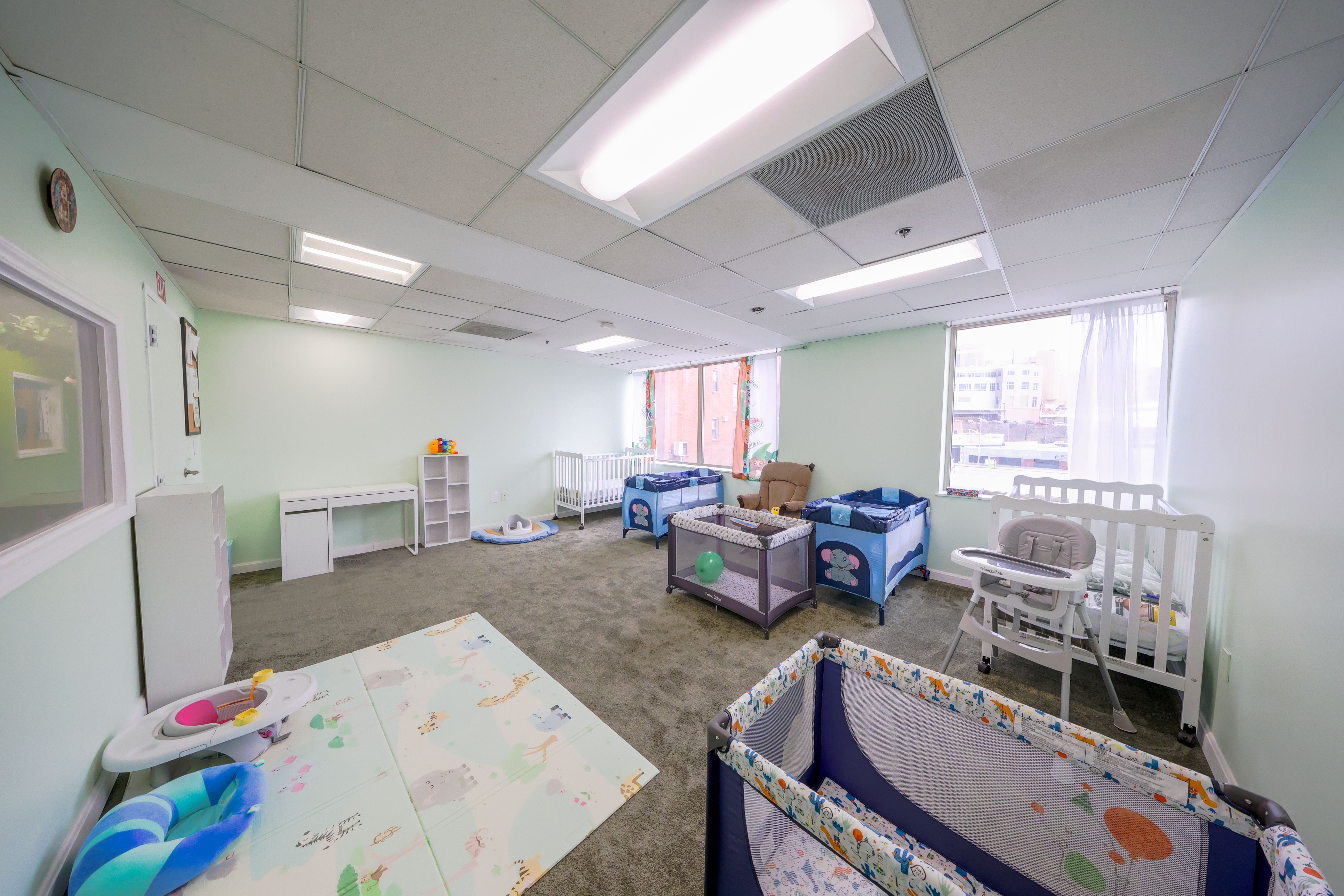 Infant in nursery care