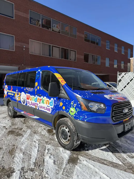 Wunderkind Planet Daycare branded van in Brighton MA