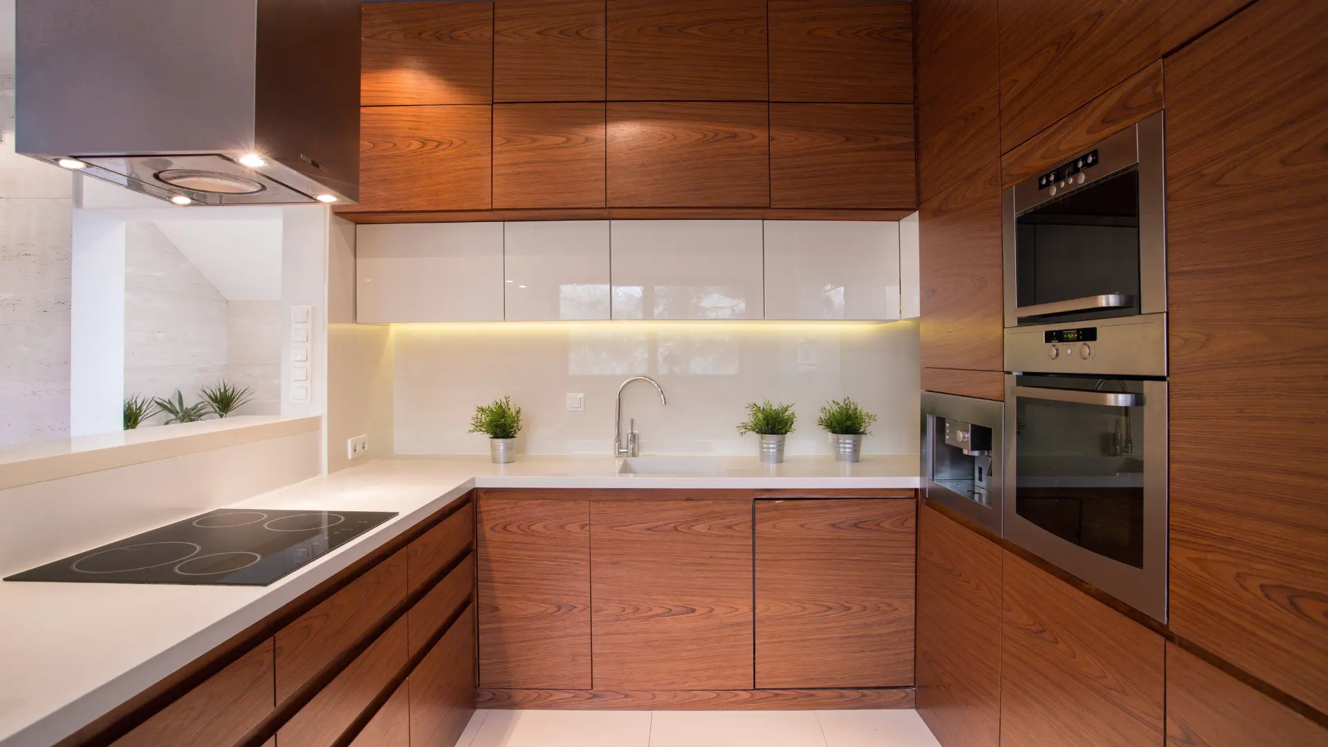 Custom wood-grain kitchen cabinets with built-in appliances, Buffalo NY