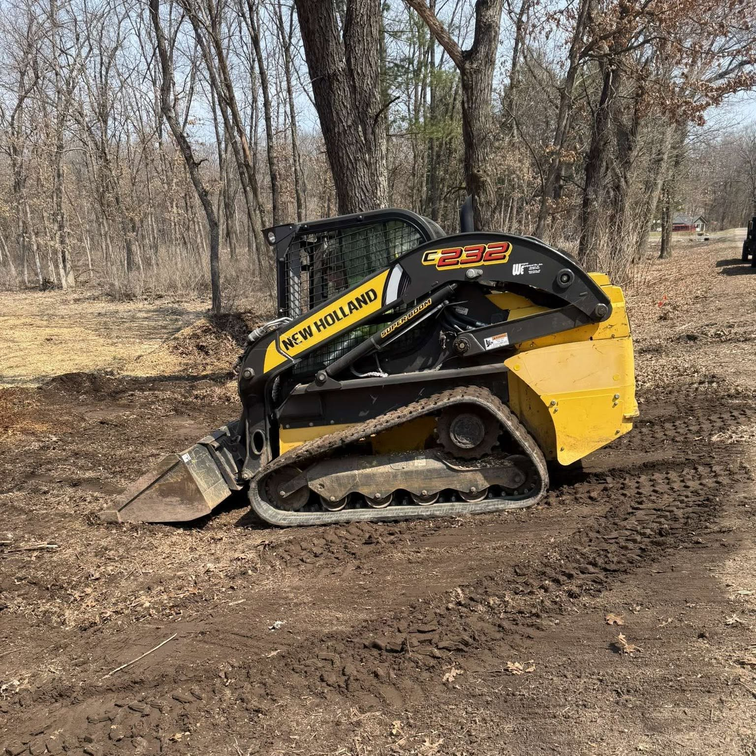 Dietzen Excavating skid steer and dump truck ready for work in the Fox Valley