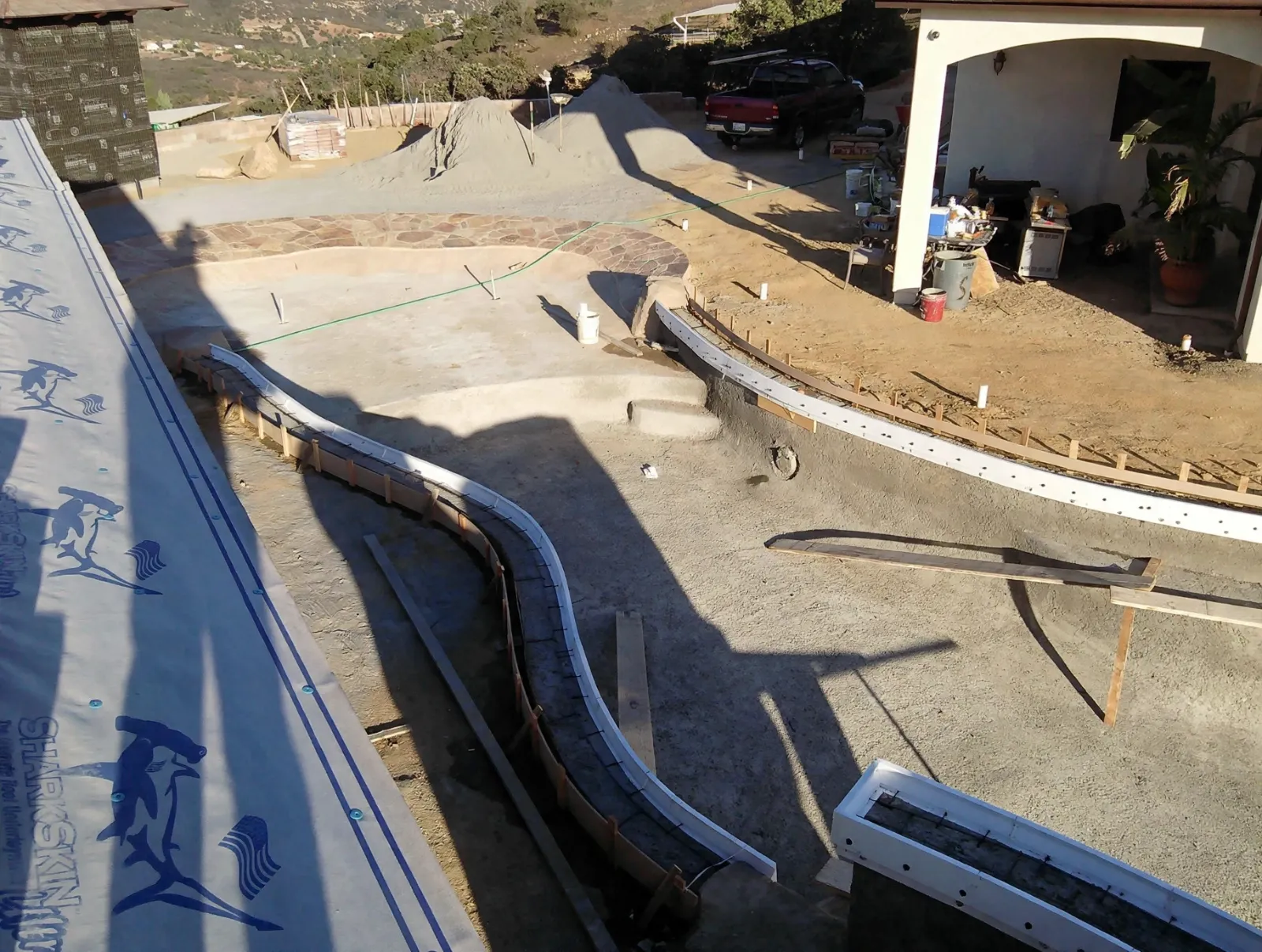 Pool coping forms and rebar set in place before the pour