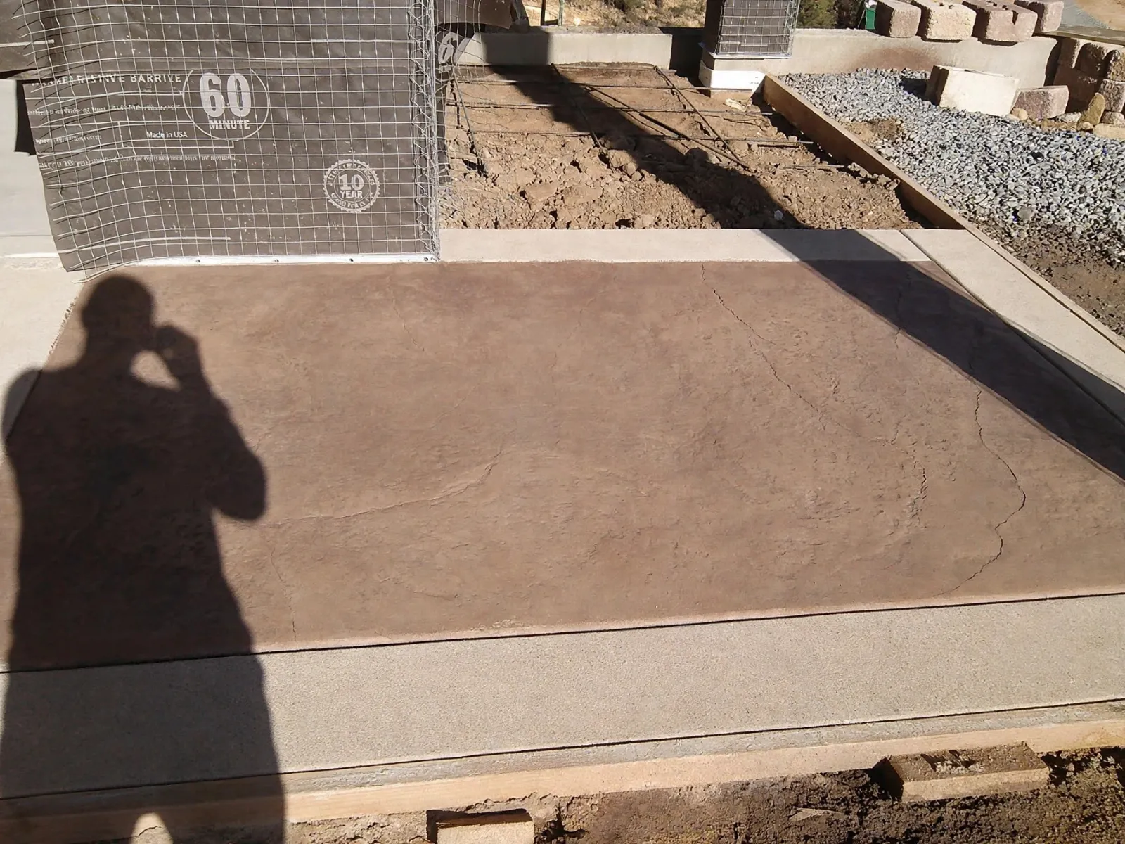 Concrete patio slab finished with a slate pattern