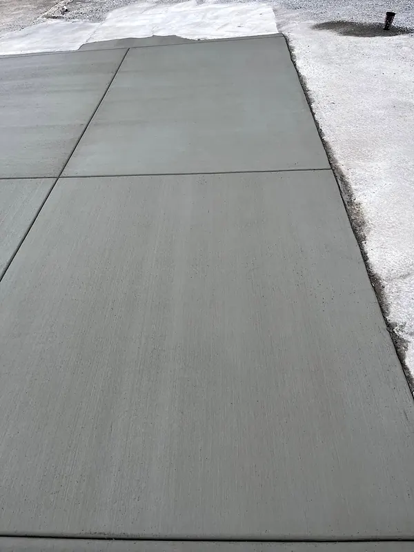 Fresh broom-finished concrete with tooled control joints, Hot Springs
