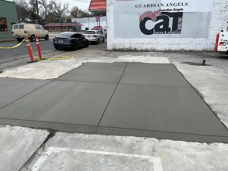 New concrete pad poured in a commercial parking lot, Hot Springs