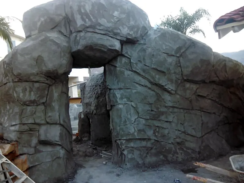 Carved faux rock arch and grotto before staining