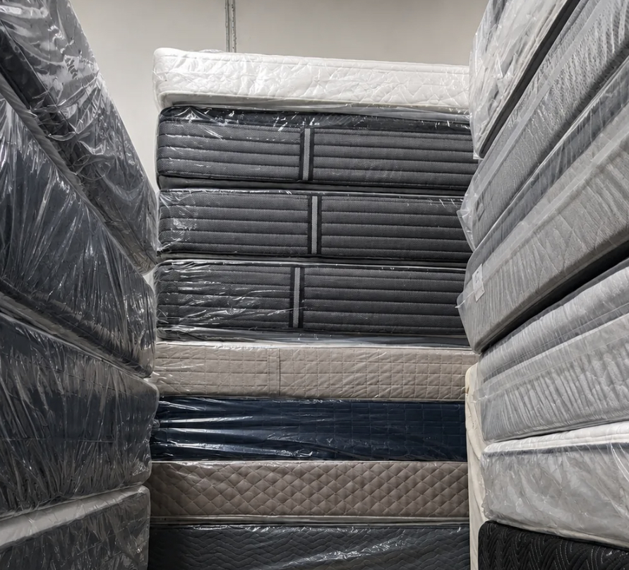 Stacked mattresses ready for sale