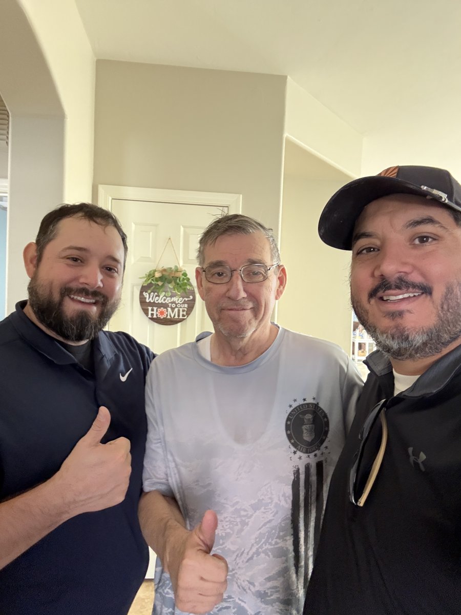 Ramon and the Southwest Roofing & Design team with a happy homeowner
