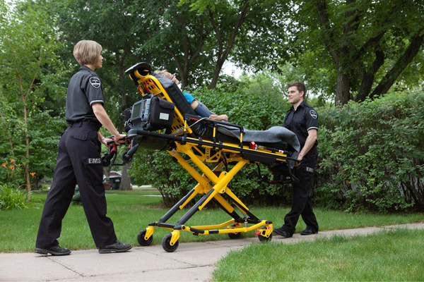A senior being taken to hospital post a fall