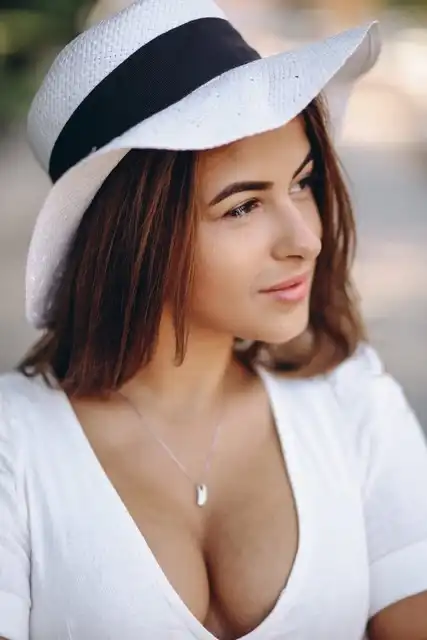 Woman considering treatment for breast implant firmness and capsular contracture