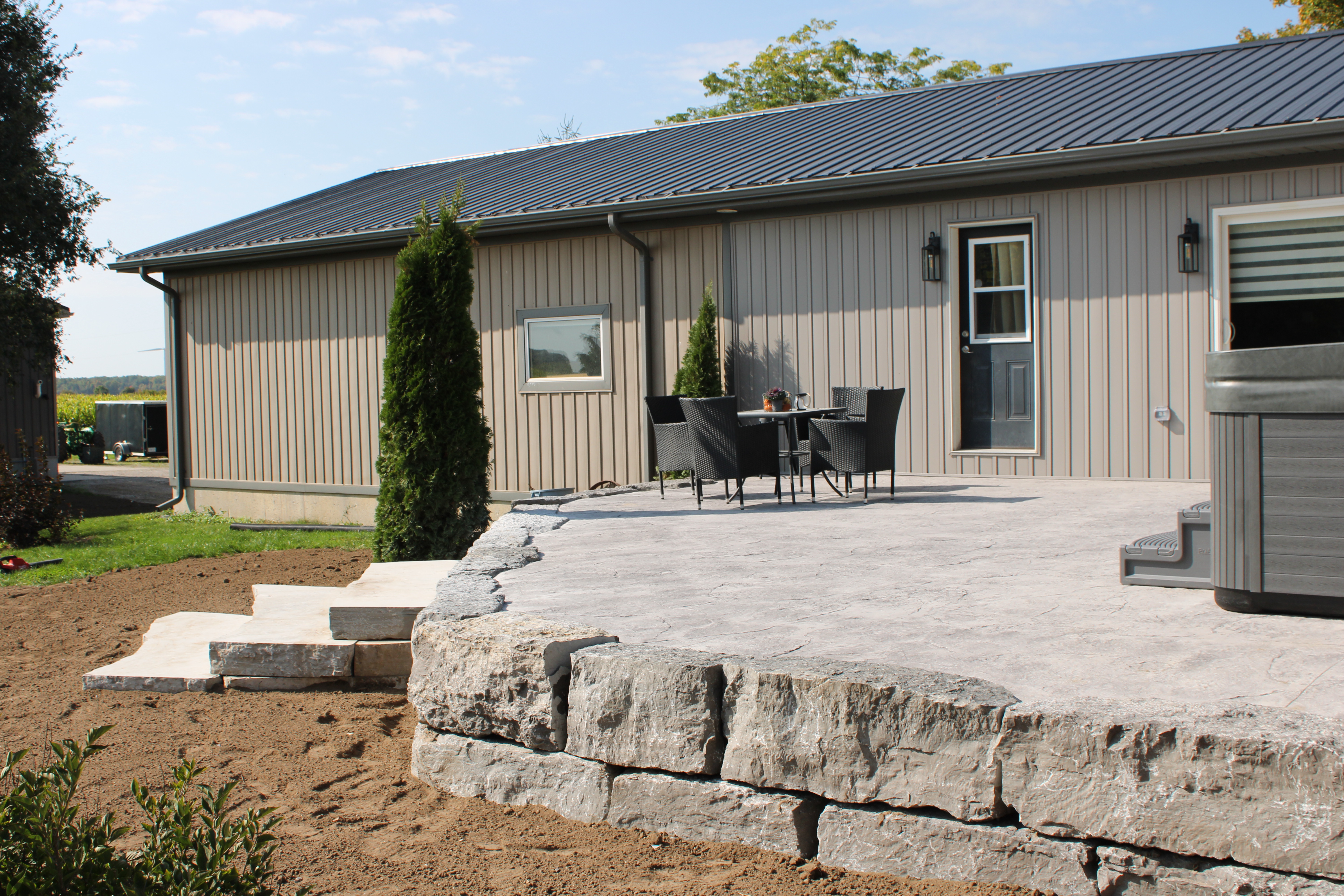 Stone Patio + Retaining Wall
